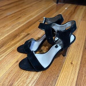 Black snakeskin heel